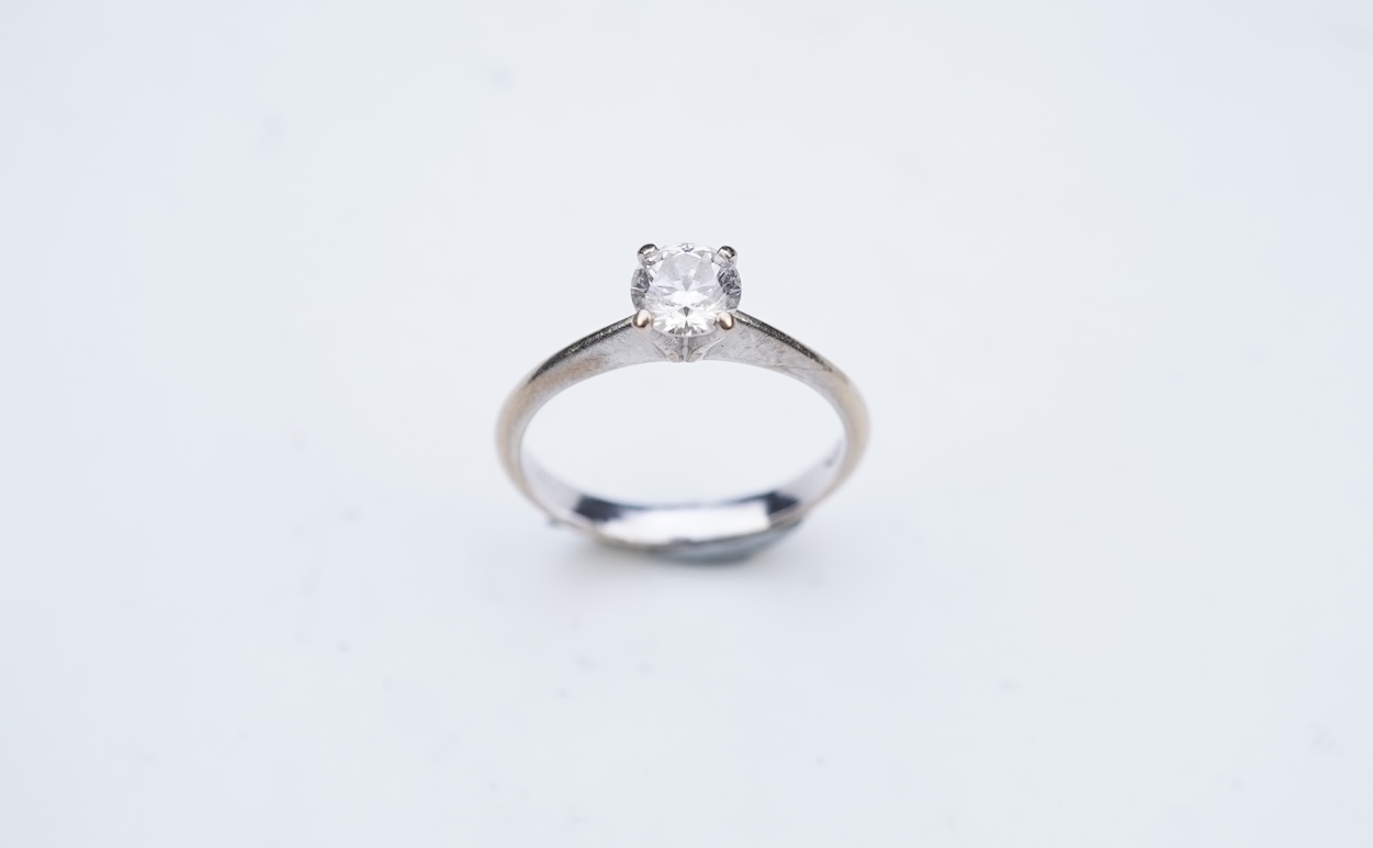 A diamond solitaire ring